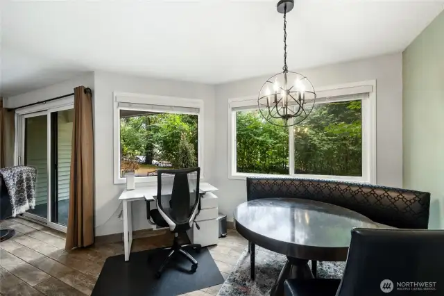 Light-filled dining area open to the living room and kitchen for easy entertaining.