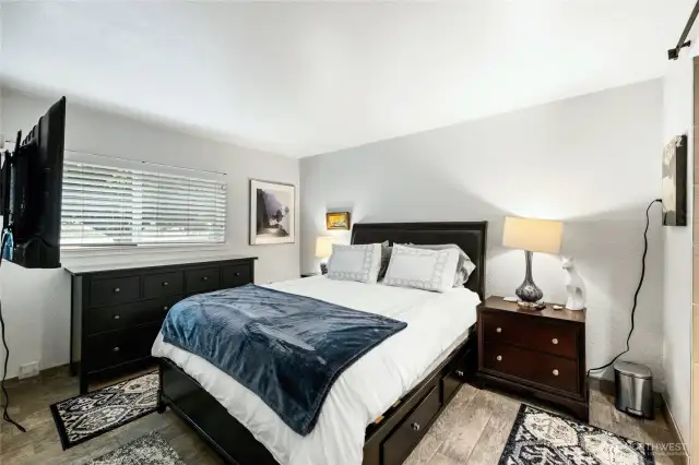 Tranquil primary suite offers respite at the end of the day.