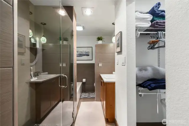 The primary bedroom boasts a spa-like bathroom and a walk-in closet.