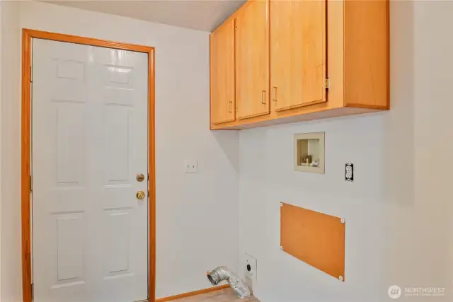 Laundry room with door to large back deck