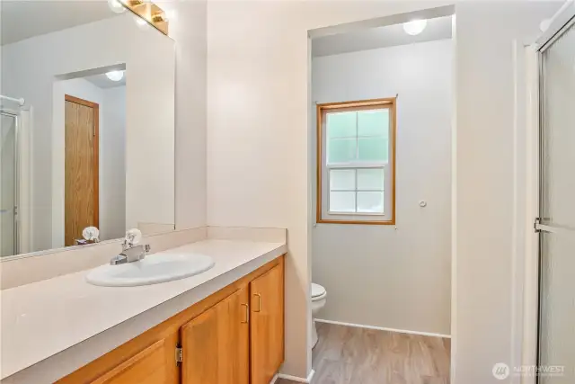 Primary bath with 3/4 shower and linen closet