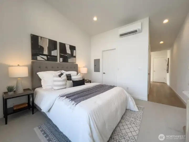 Bedroom flows into attached walk-in closet