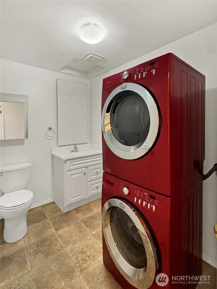 Guest bath and laundry. All appliances to remain