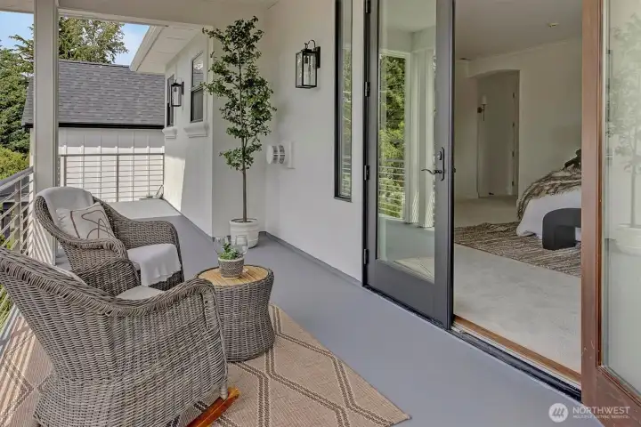 An extension of the owner's suite,   this elegant deck offers a serene space for morning coffee, fresh air and peaceful moments.