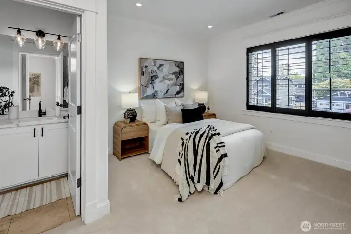 Secondary bedrooms feature designer carpet, large picture windows and modern bathrooms!