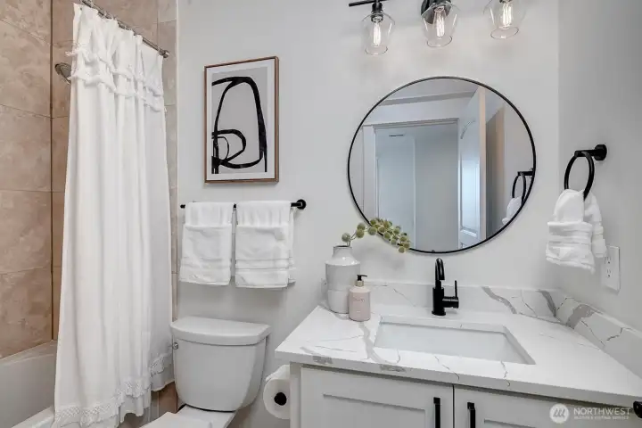 Secondary bedrooms feature designer carpet, large picture windows and modern bathrooms!