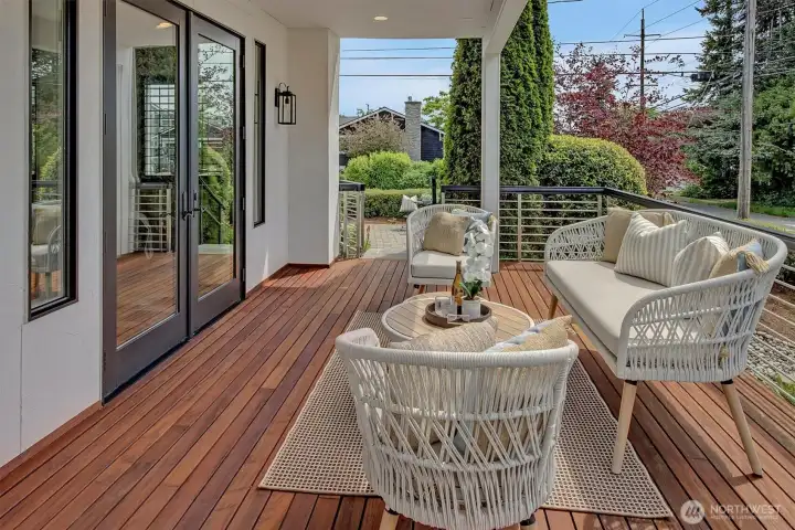 Gorgeous French Doors lead off the Great Room to your private Ipe deck surrounded by gorgeous landscaping and a flowing fountain.