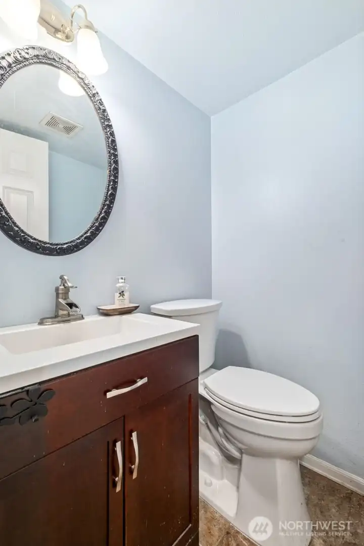 Updated half bath on the main level.