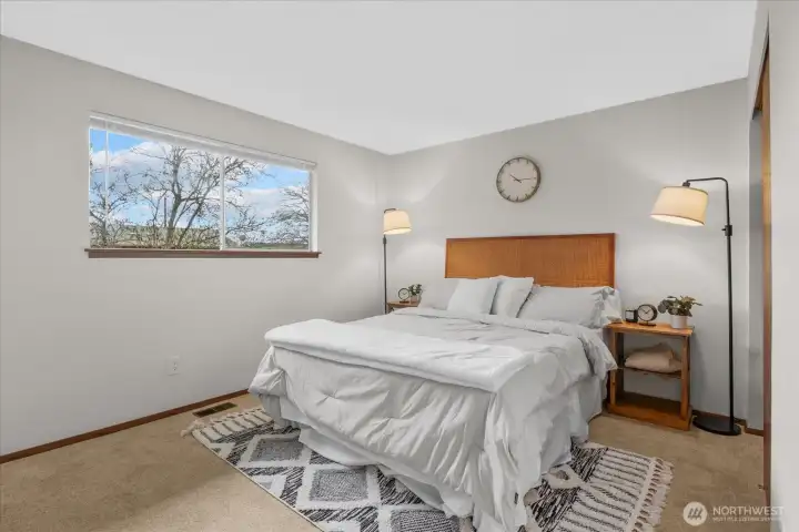 Primary bedroom featuring freshly repainted walls.