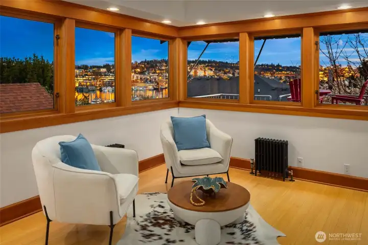 Walls of windows with panoramic lake and city views