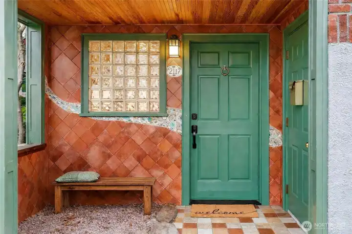 Artisan tile entry with warm wood detail