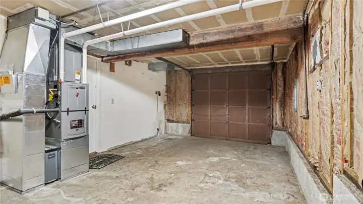 One car garage offers plenty of room for parking and storage.