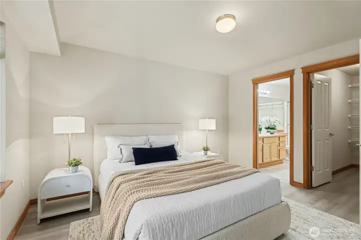 Primary ensuite bedroom with walk in closet