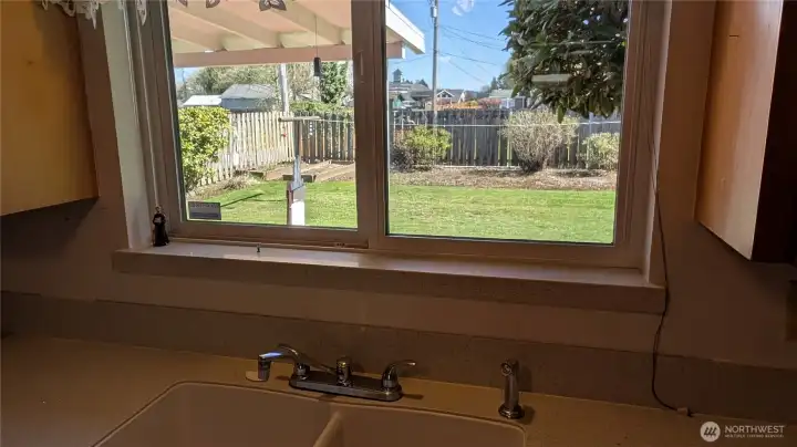 View of backyard from the kitchen window