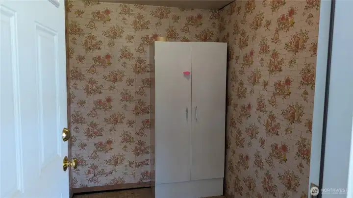 Large mudroom at carport entrance door