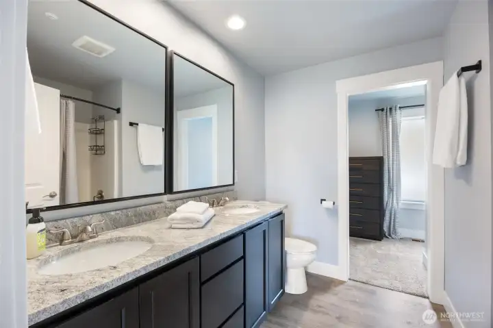 Main floor primary leads to walk in closet