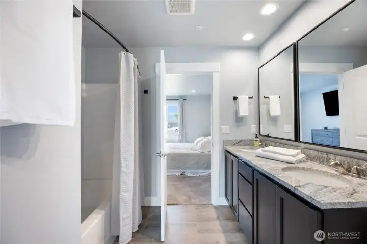 Main floor primary bath with double sinks