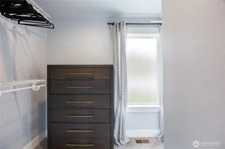 Large walk in closet, wraps around to the right