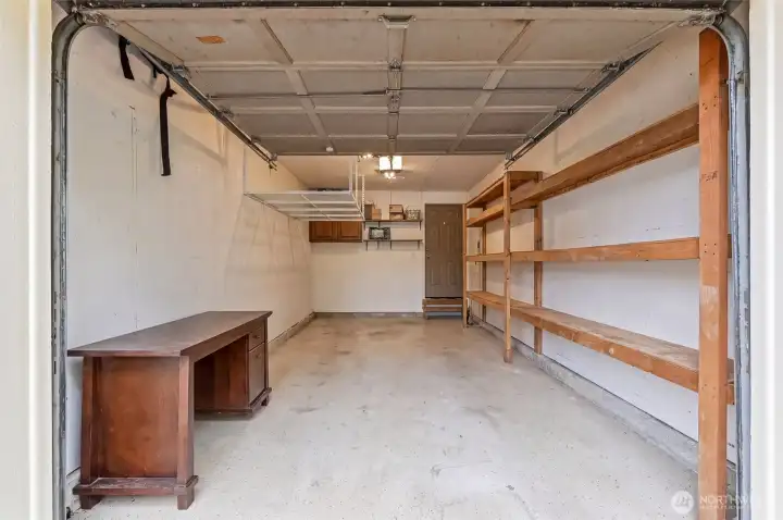 1 car garage w/attached shelving