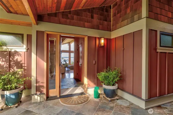 Covered breezeway between garage and front entry