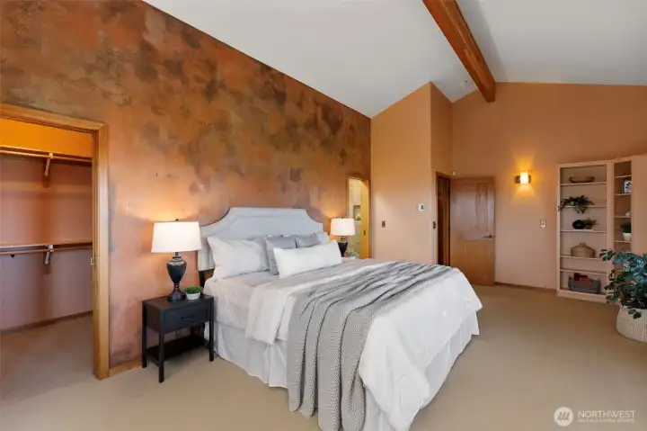 Primary bedroom with walk in closet