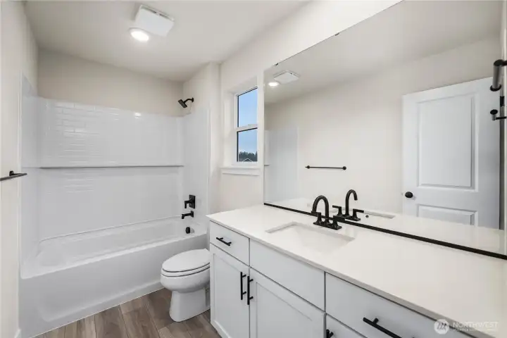 Photos of a previously completed home. Actual colors and finishes may vary. See site agent for details.