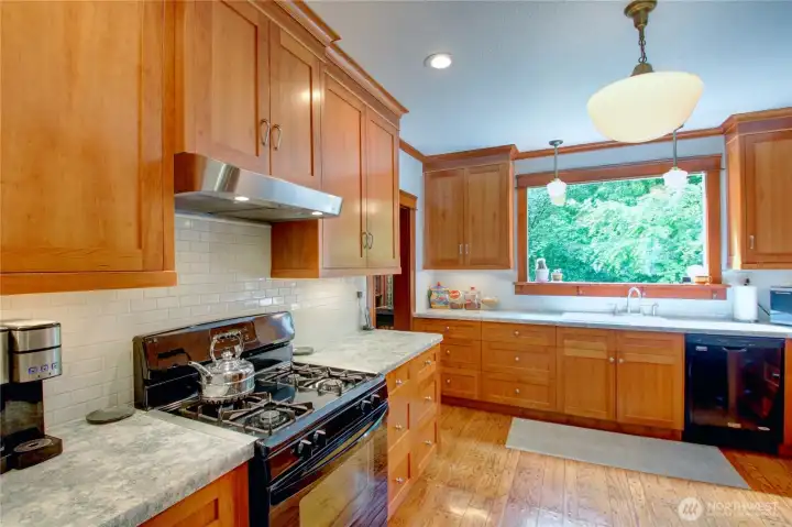 Amazing kitchen with cherry cabinetry.