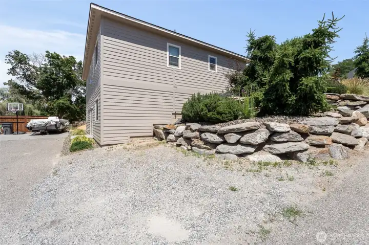 Nice parking area on side of home