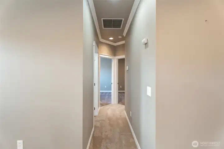 hallway to bedrooms and full bathroom on main floor