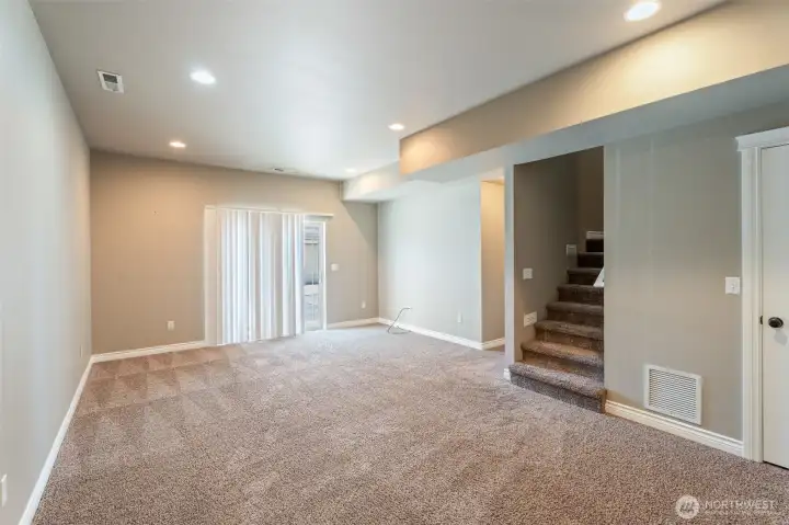 Family room with slider on lower level
