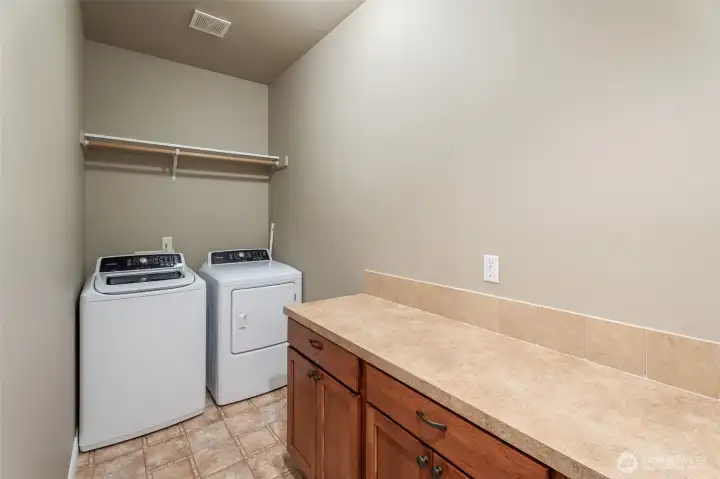 Lower-level laundry- and counter area- mini kitchen?