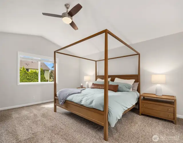 Generous in size is the primary en'suite w/vaulted ceilings, adjacent 5 pc bath and walk-in closet. Backs to the beautiful back yard, so private and peaceful.