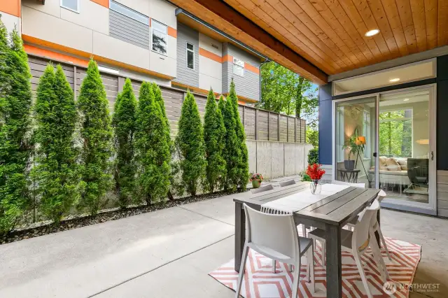 Covered patio that can be opened up to both the formal dining and family room