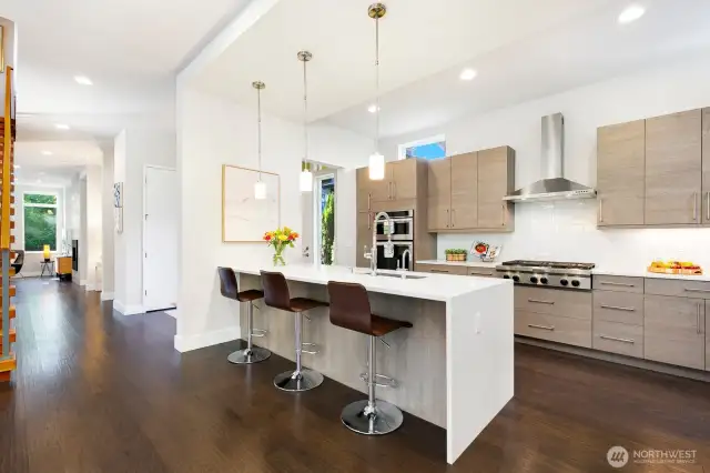 Glass tile backsplash, stainless steel appliances