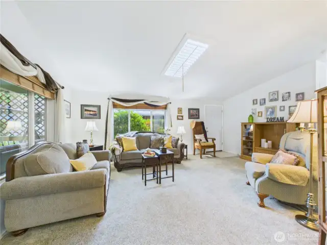 Step  right out to the large covered back deck from the living and Dining room area. Easy access when entertaining.