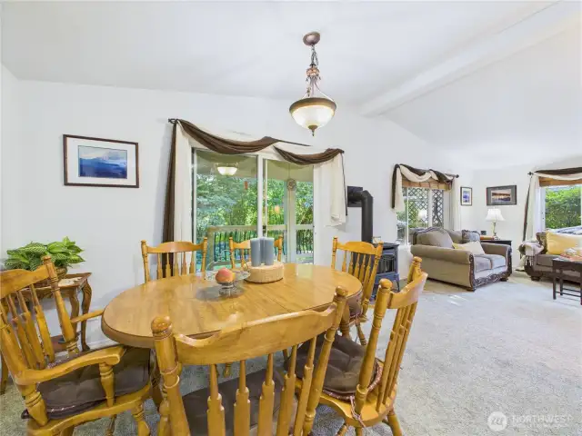 The dining area has room for a large table and is conveniently located between the outside and inside entertaining areas.