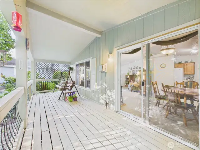 The covered back deck is a perfect place to sip lemonade on hot summers days.