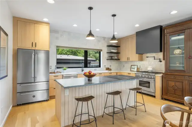 Remastered kitchen. Stout soapstone countertops. Pendant lighting. Stainless steel appliances.