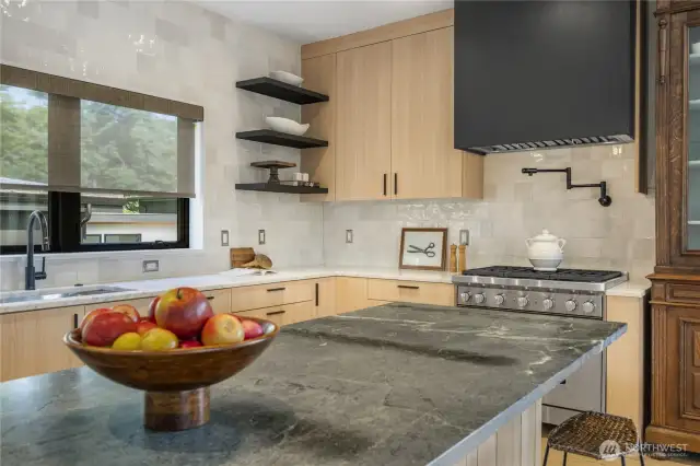 Wolf 6-burner gas oven. Plus, an awesome pot filler that you'll wonder how you ever lived without!