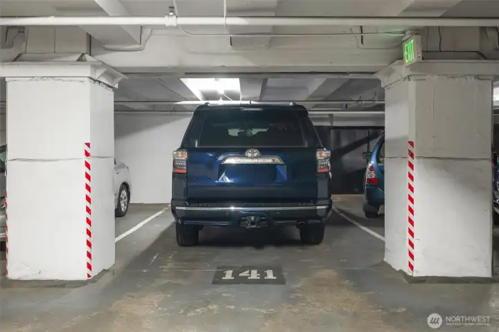 Second secure parking space on lower level - big enough for large SUVs!