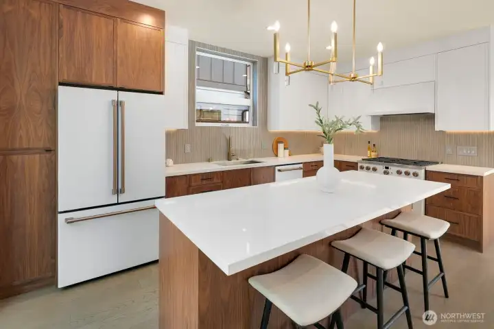 White matte Cafe appliances package. 6-Burner gas range. Gold accents.