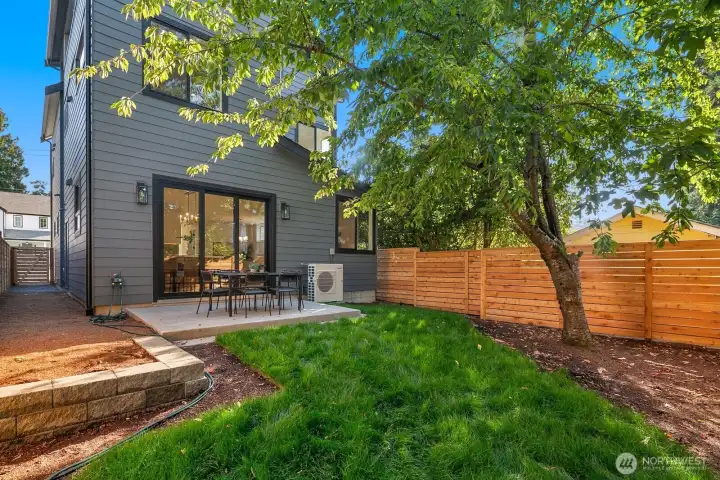 The backyard is fully fenced, level and has space for an outdoor dining table and barbecue.