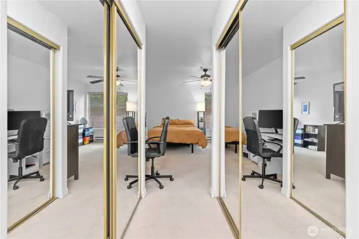 The spacious primary bedroom suite offers ample closet space (both sides of the walk through from bedroom to bath are closets)