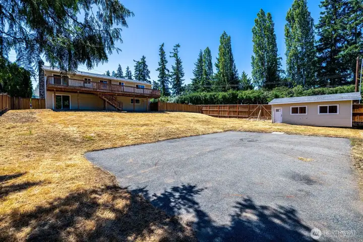 Stand alone concrete patio used for sports court in past