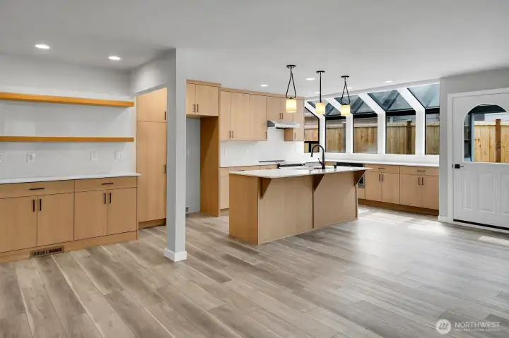 Beautifully updated kitchen with atrium style windows allow the light to flood into this space!