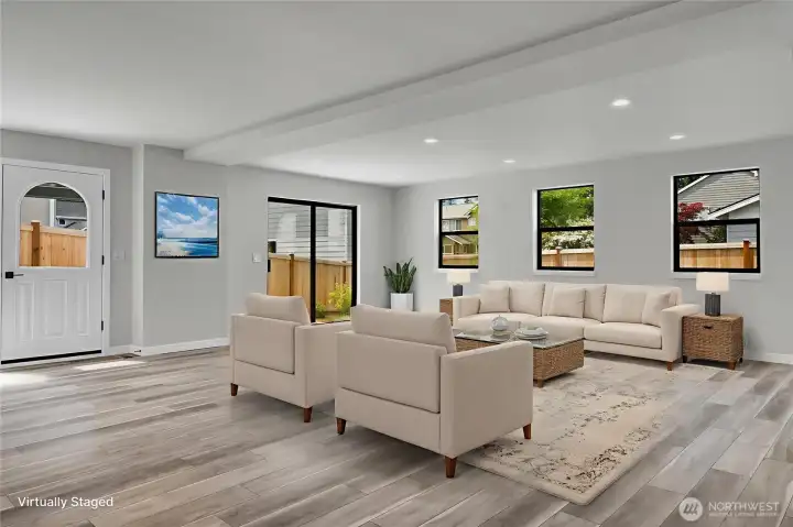 HUGE great room with 2 access points to the patio for ease of entertaining. Virtually staged.