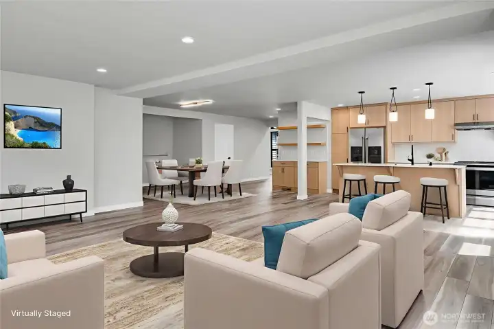 Generous space for both lounging and dining. The large island provides casual seating or a great homework area! Virtually staged.