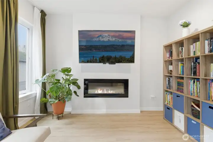 Spacious living room with electric fireplace