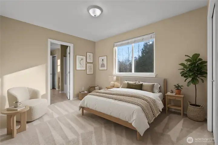 Guest bedroom 2 with Jack-n-Jill bath between this and guest bedroom 1 (virtually staged).