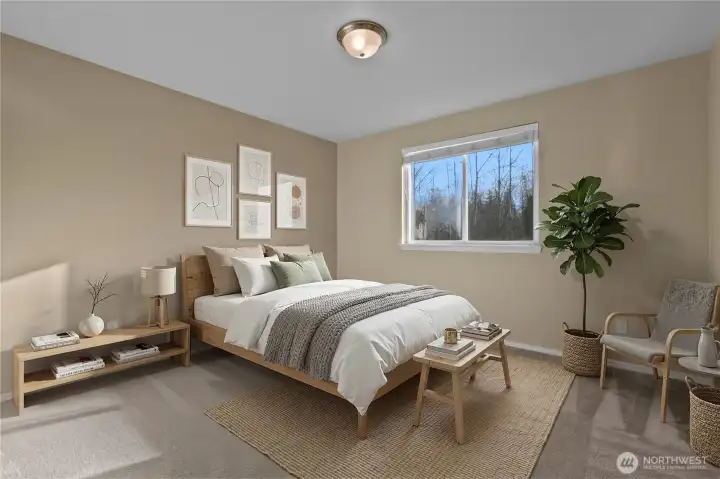 Guest bedroom 3 (virtually staged), next door to laundry.